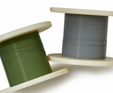 DR PTFE coated spools shown with DR-96 on the left and DR-97 on the right